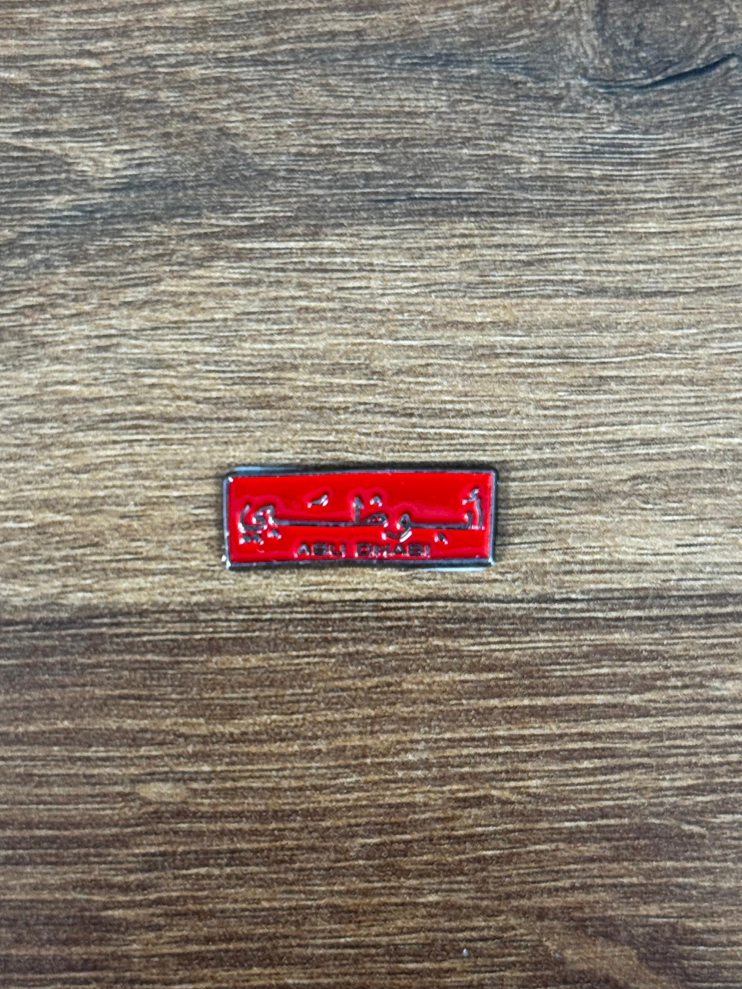 Badge Abu Dhabi red